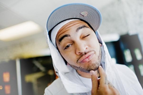 Travie McCoy flys high on the cover of his solo debut album Lazarus 